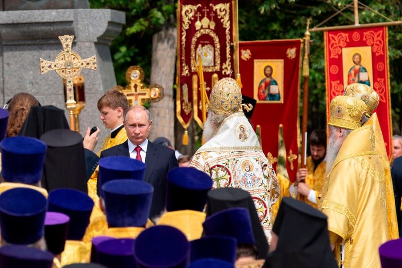 Russian President Vladimir Putin attends a ceremony marking the 1,030th anniversary of the adoption of Christianity by Prince Vladimir, the leader of Kievan Rus, in Moscow on July 28, 2018.