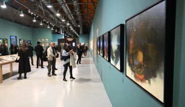 Guests walk through the main hall of CerModern while exploring works from the Rewind/Slovenia exhibition in Ankara, Türkiye, November 6, 2025. (AA Photo)