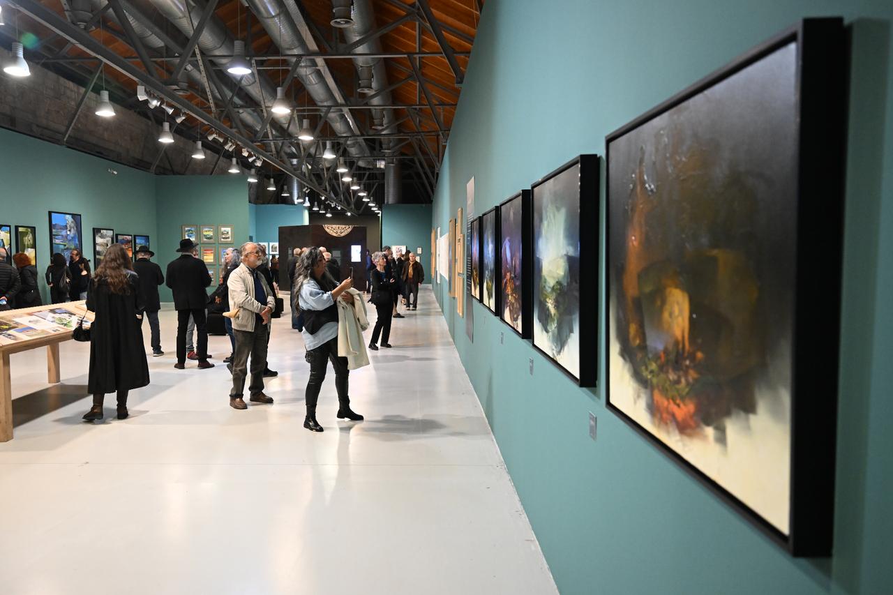 Guests walk through the main hall of CerModern while exploring works from the Rewind/Slovenia exhibition in Ankara, Türkiye, November 6, 2025. (AA Photo)