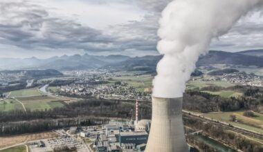 white smoke coming out from factory