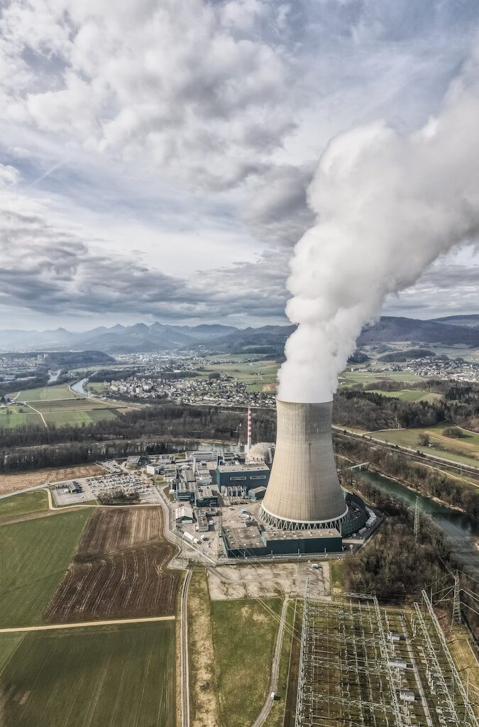 white smoke coming out from factory