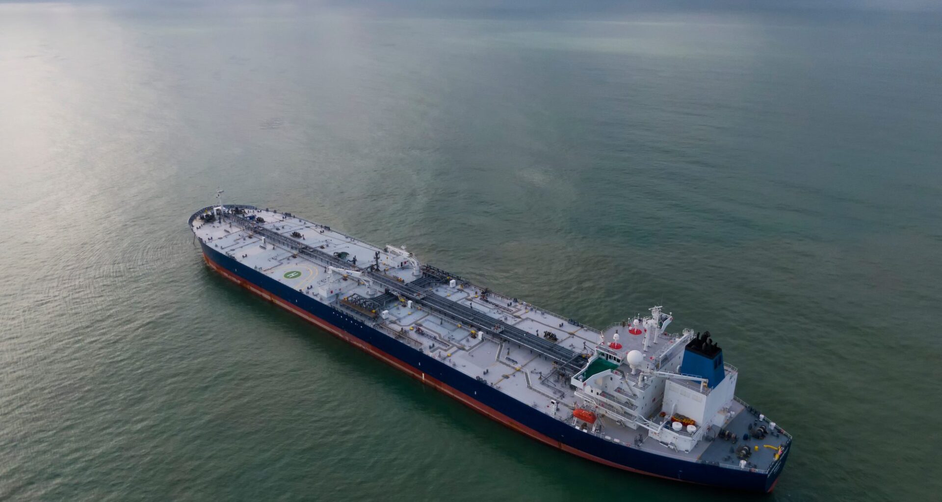 Aerial photo of an oil tanker at anchor. Stock Photo: Nickeo23/Shutterstock