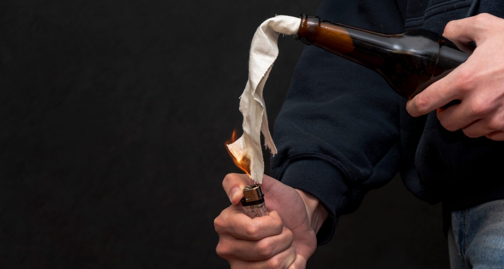 Man Pleads Guilty to Possessing Molotov Cocktail During ICE Protests