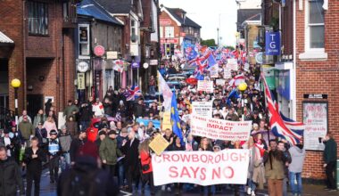 Protesters march against plans to house asylum seekers at an army barracks in Crowborough, East Sussex. Pic: PA