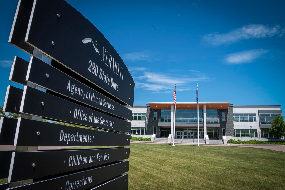 a building with a large sign in front of it.