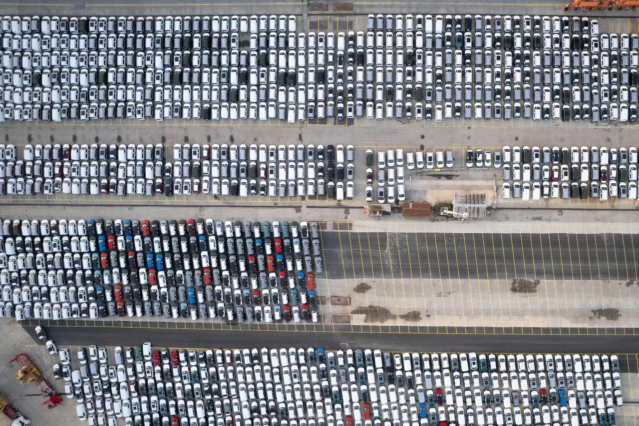 Photo shows aerial top down view of hundreds of new cars parked at Haydarpasa port in Istanbul, Türkiye, accessed on Nov. 1, 2025. (Adobe Stock Photo)