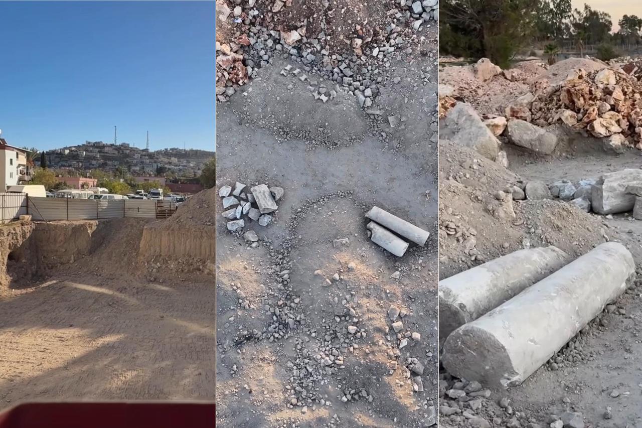 Broken column shafts and architectural stone fragments are seen dumped and scattered in the spoil area near the construction site in Silifke’s archaeological zone, Mersin, Türkiye. (Photo via Instagram/@silifkehaberajansi)