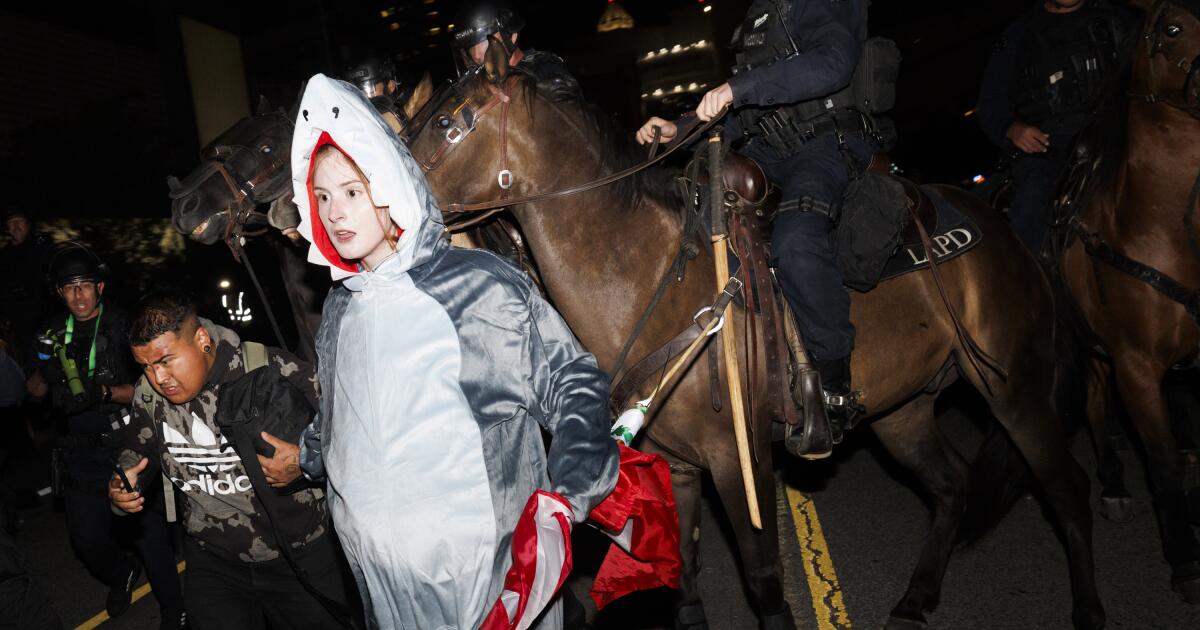 Police declare 'unlawful assembly' at downtown L.A. protest