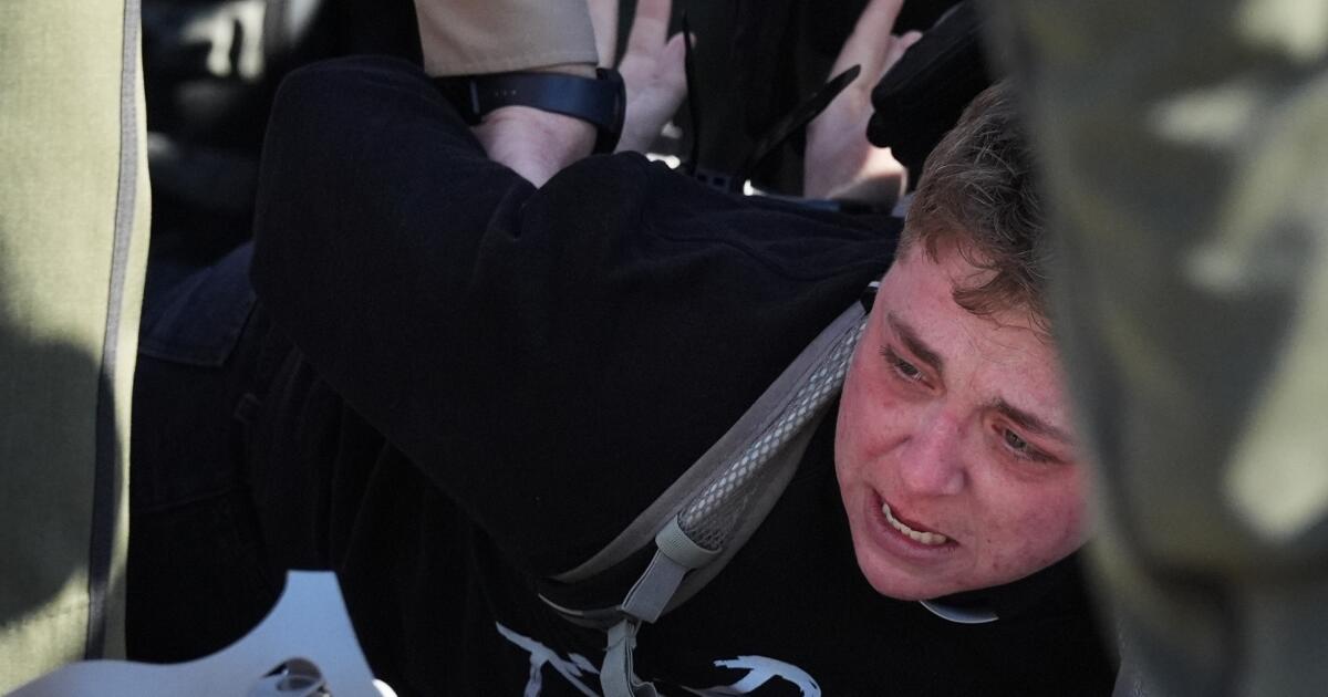 Protesters arrested after clashing with police outside Chicago-area immigration facility