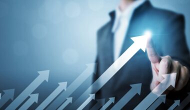 A person near several upward pointing arrows.