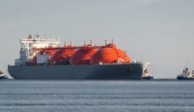 View of a liquefied natural gas (LNG) carrier escorted by tugboats at sea, accessed on Nov. 21, 2025. (Adobe Stock Photo)