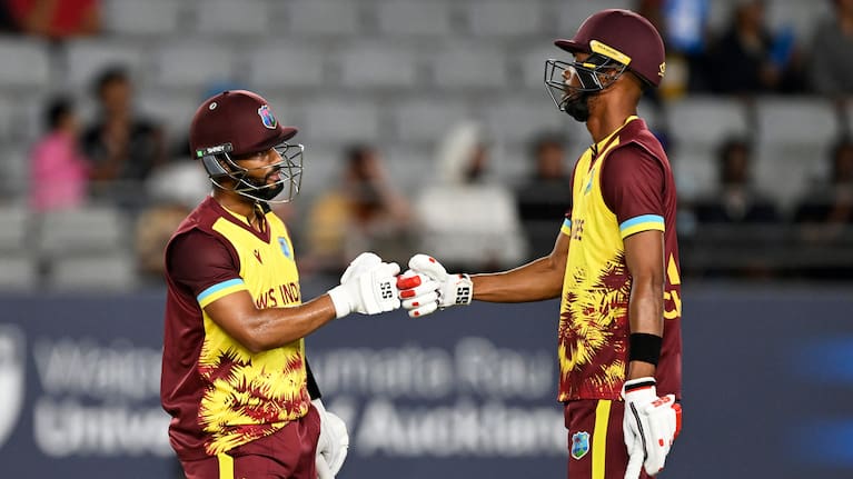 West Indies' Shai Hope, left, and Roston Chase react after their 50 partnership during the T20 cricket international between New Zealand and the West Indies.