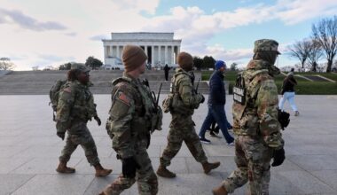 US halts all asylum decisions as suspect in shooting of National Guard members faces murder charge