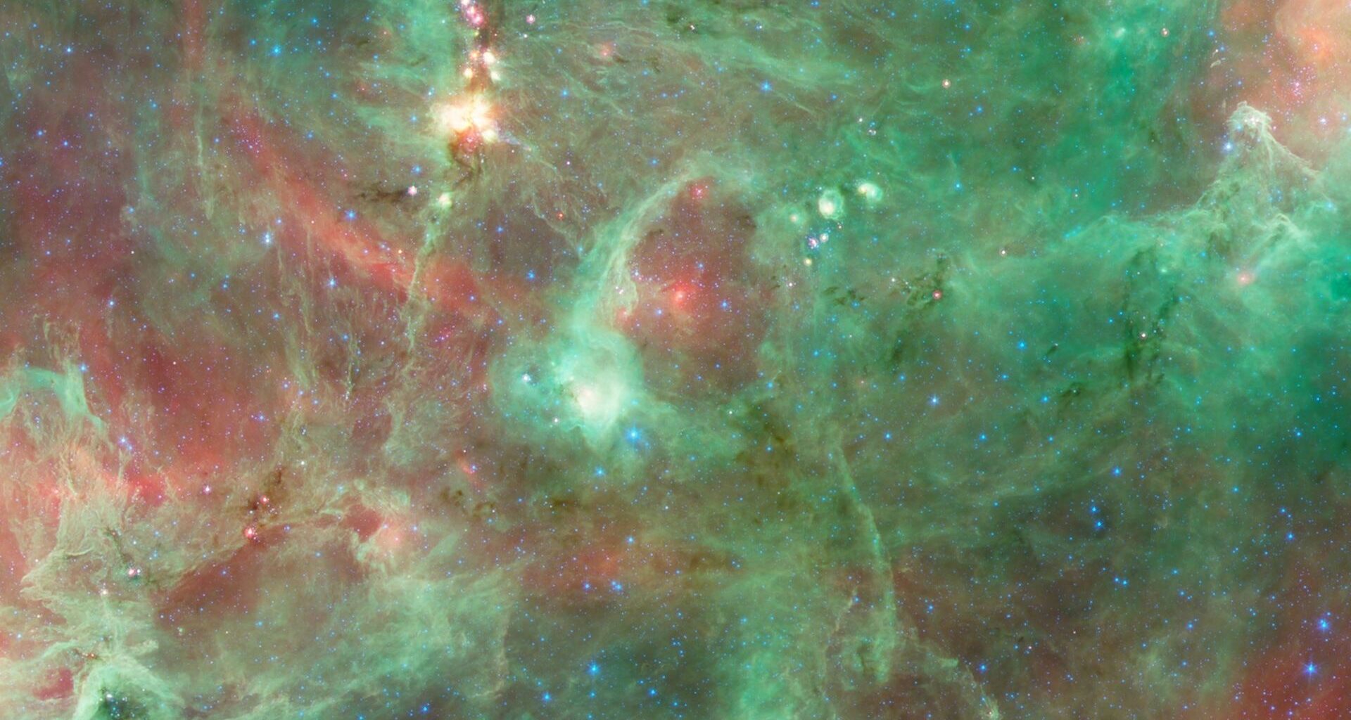 A glowing gas ring in green and red colors in outer space