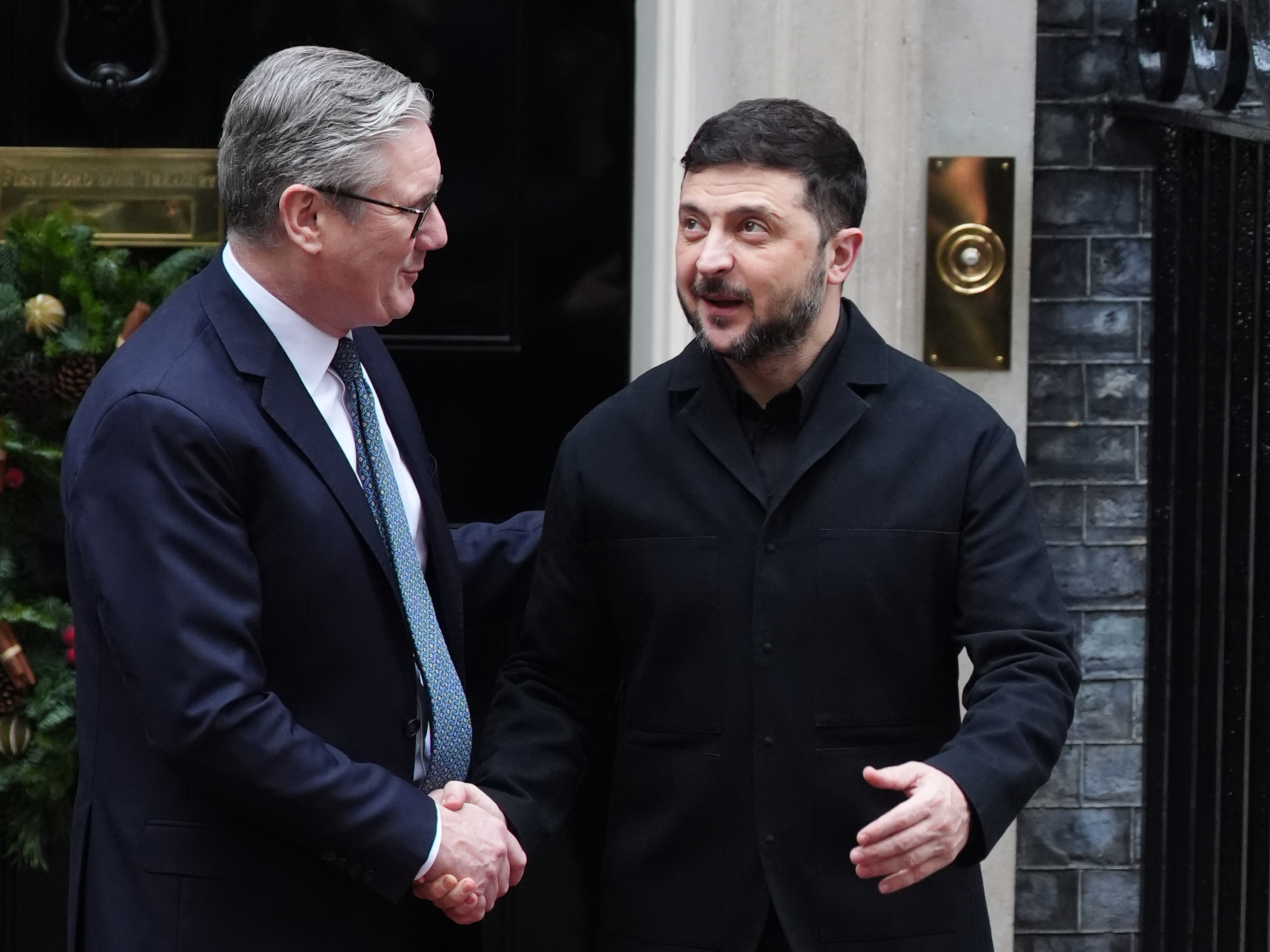 Prime Minister Sir Keir Starmer shaking hands with Ukrainian President Volodymyr Zelensky outside Number 10 Downing Street.