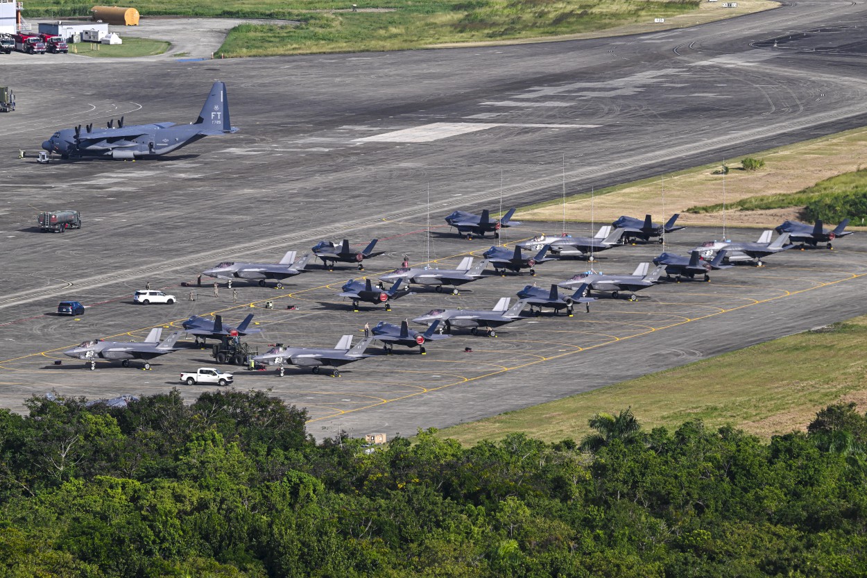 US Air Force F-35A fighter jets and one C-130 sit on the tarmac at José Aponte de la Torre Airport in Ceiba, Puerto Rico.