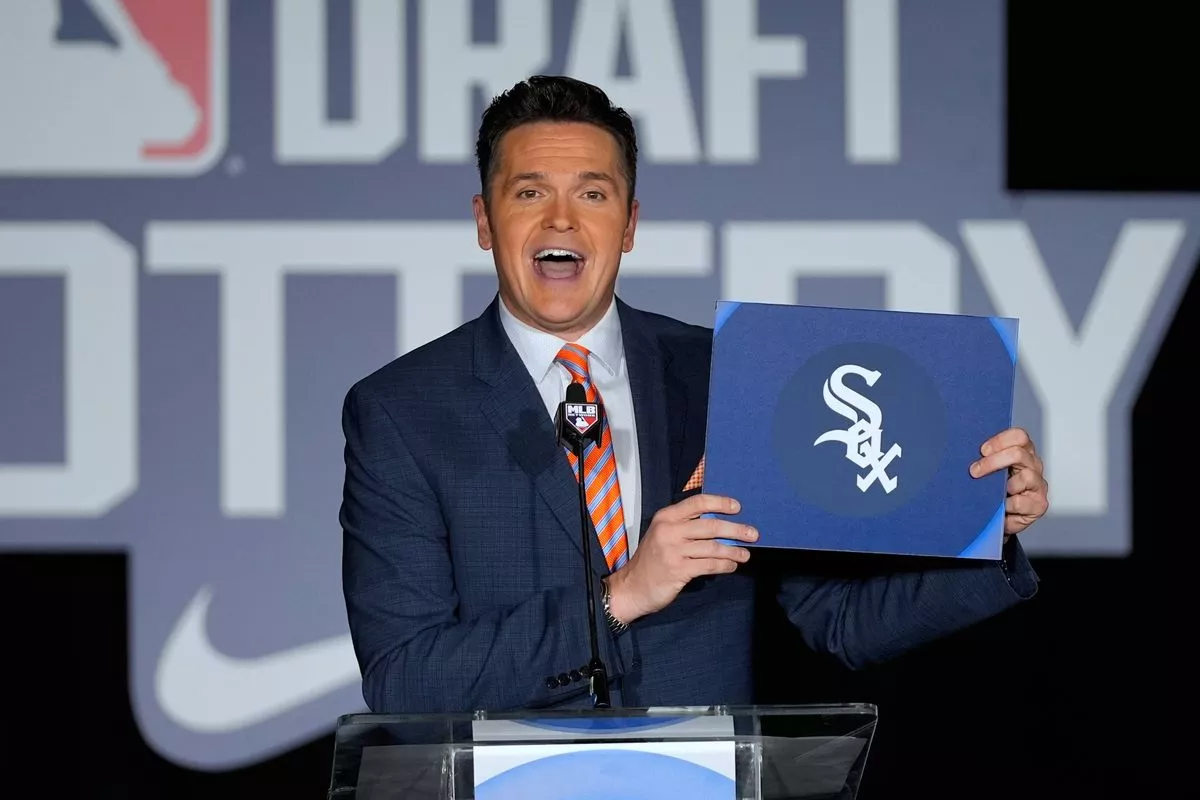 Greg Amsinger, MLB Network host, announces that the Chicago White Sox will have the number one pick in draft during a broadcast at the Major League Baseball's winter meetings, Tuesday, Dec. 9, 2025, in Orlando, Fla. (AP Photo/John Raoux)