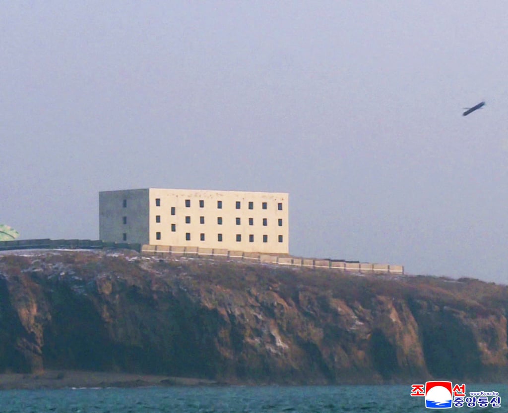 A missile moments before hitting its target. Photo: KCNA via AFP