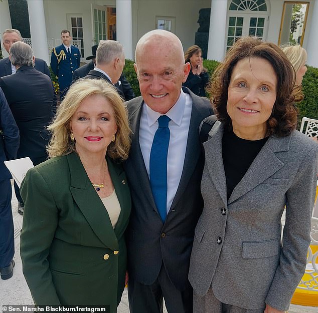 Kirk was raised in the affluent Chicago suburb of Prospect Heights by his parents, Kathryn (left), 68, a mental health counselor, and his father Robert (center), 73, an architect - both political moderates, according to The Guardian