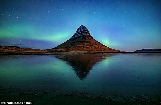 Next year is being tipped as the best year to enjoy the Northern Lights in more than a decade as the latest 11-year activity cycle peaks. Kirkjufell mountain in Iceland is pictured