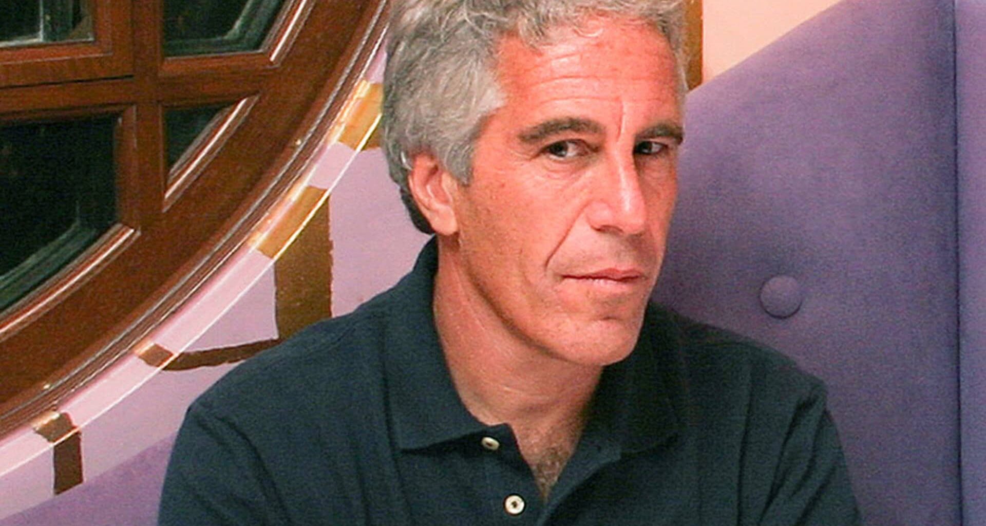 Documents, Trump photo, removed from DOJ site