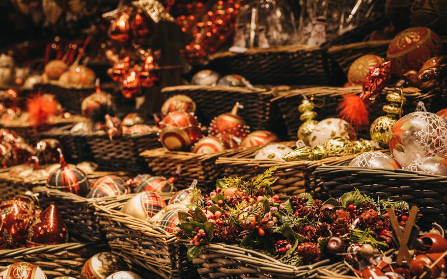Variety of Christmas tree decorations on sale at a European Christmas market.