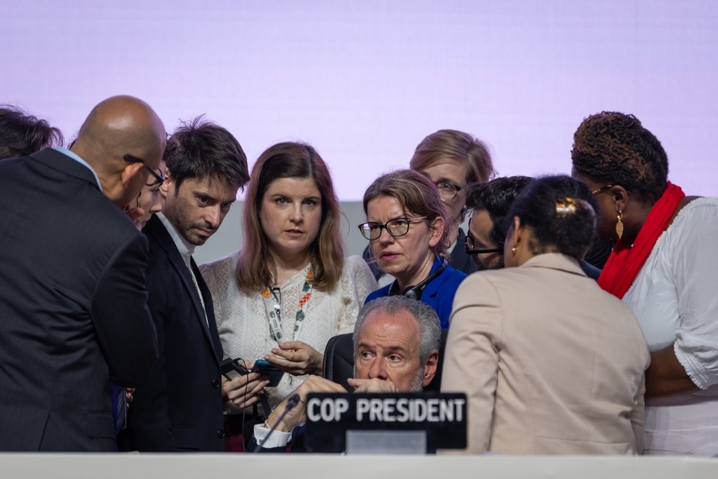 COP30 Presidency and and the UNFCCC Secretariat consult during a break after Colombia's intervention at the COP30 Closing Plenary.