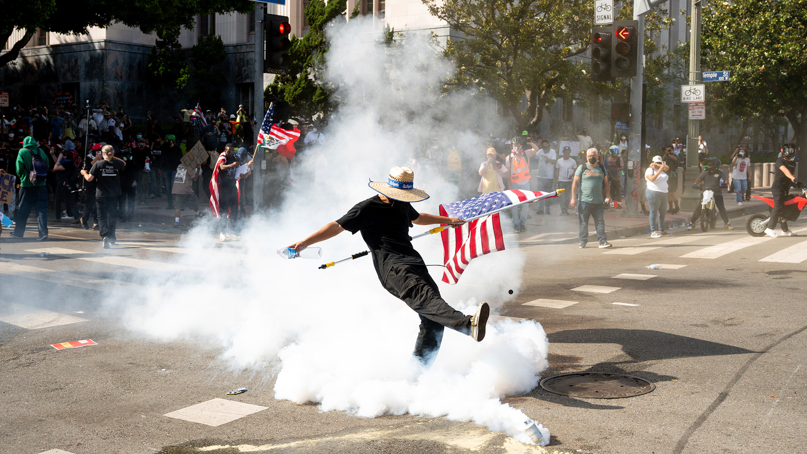 'No Kings' protests: Tensions rise in LA as crowd hurls concrete, fireworks, police allege