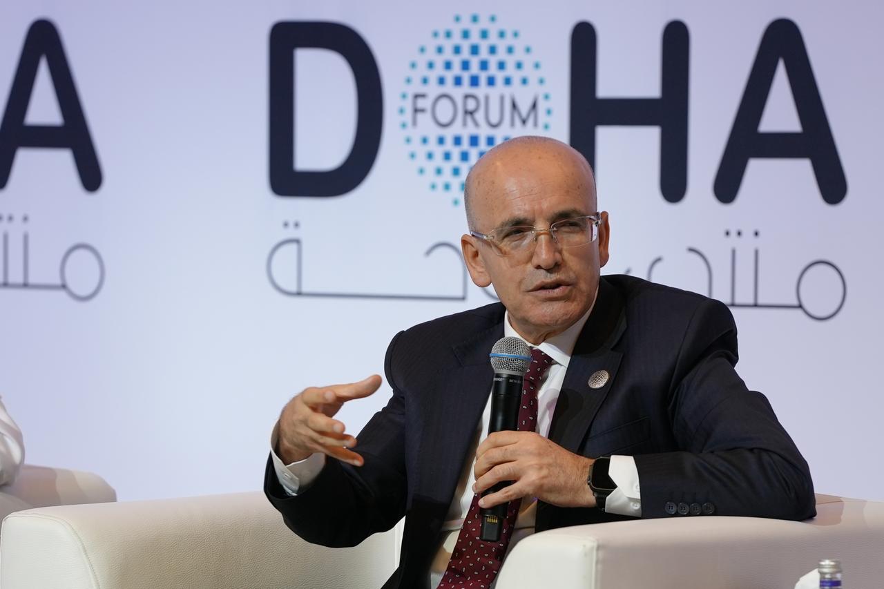 Türkiye’s Minister of Treasury and Finance Mehmet Simsek speaks at the panel titled  Shock Waves and Safety Nets: Rethinking Trade in an Age of Disruption  during the Doha Forum 2025 in Doha, Qatar, December 6, 2025. (AA Photo)