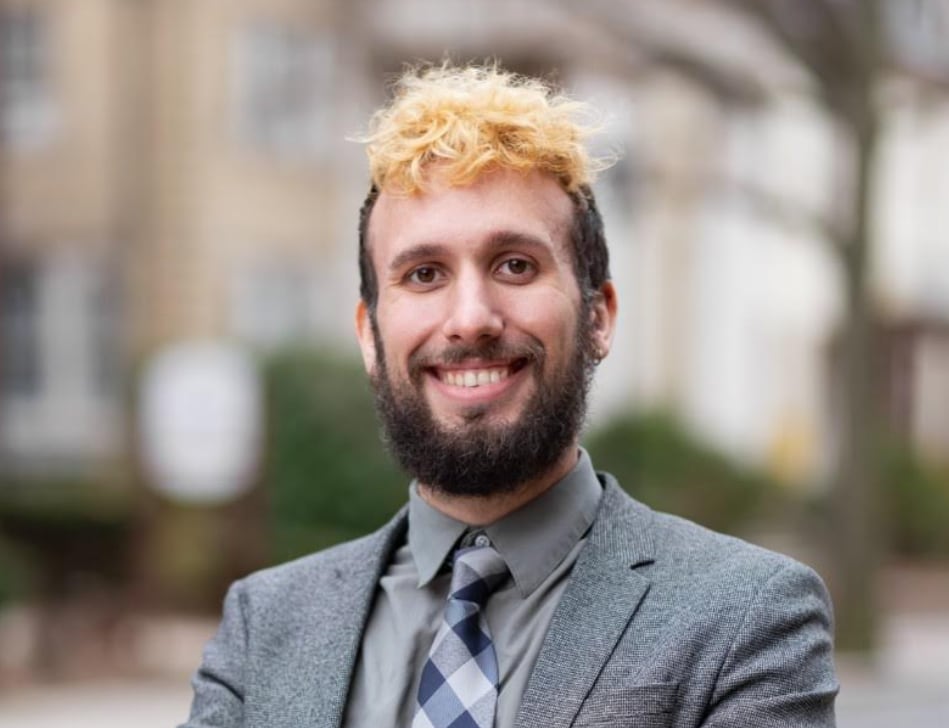 A man poses for a photo