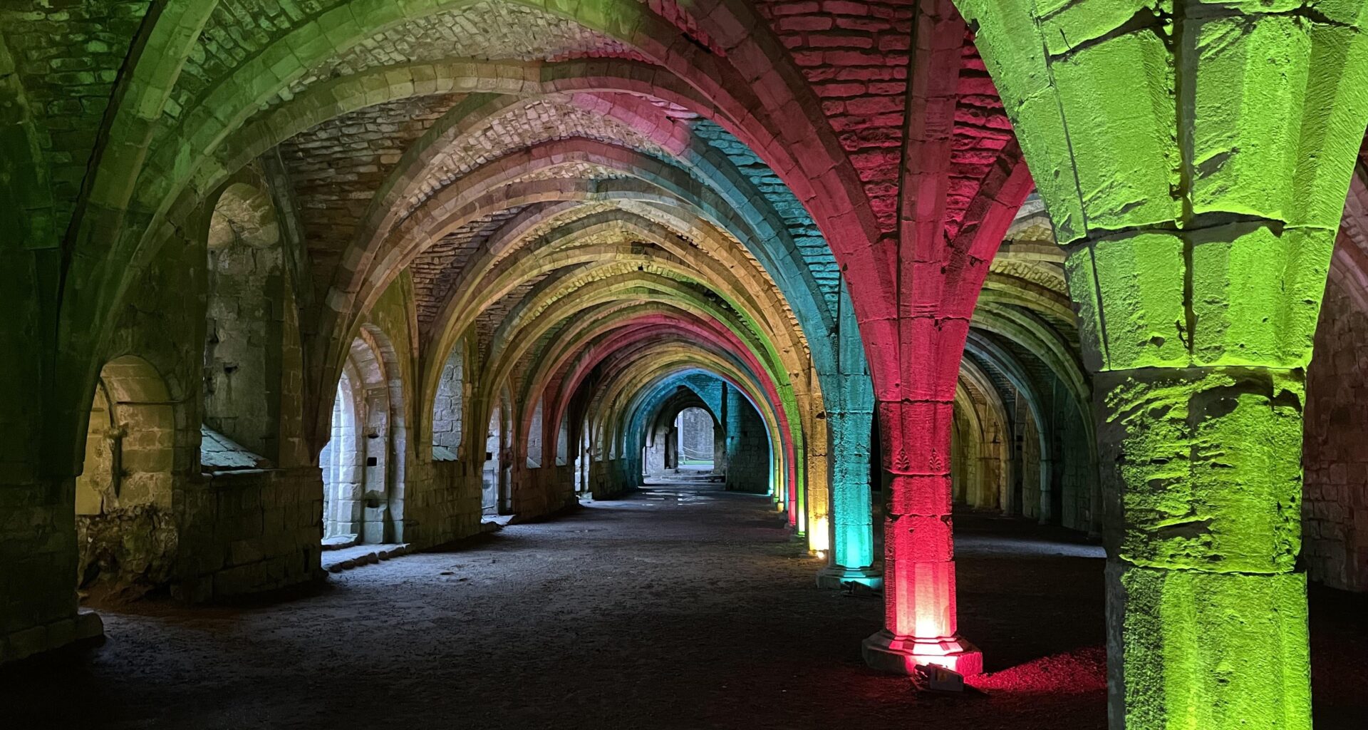 Every year, Fountains Abbey in Ripon is illuminated with rainbow lights for Christmas