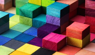 Colourful  wooden squares piles on top of each-other.