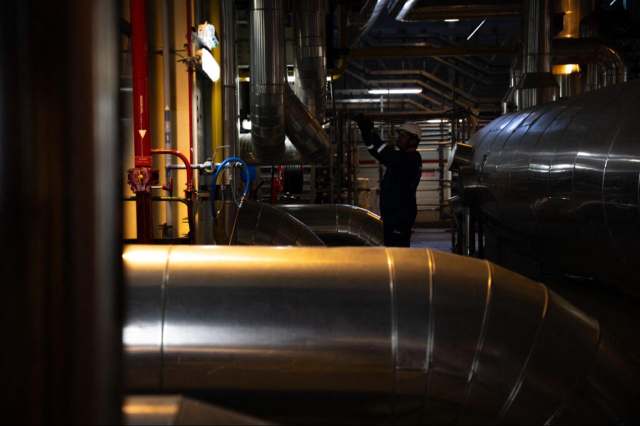 An employee of French state-controlled energy giant EDF works in the "machines' area" in a building of the nuclear power plant of Flamanville, north-western France, April 25, 2024. (AFP Photo)