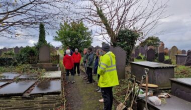 Refugees and asylum-seekers plant bluebells in Welsh churchyard to encourage friendship