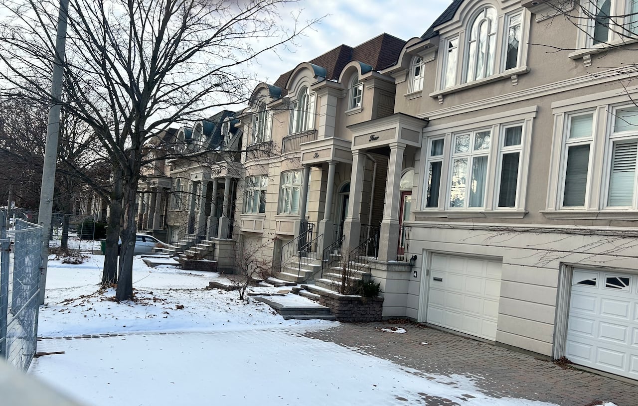 Ten upscale homes on Glazebrook Avenue have been sitting empty for about a year now. Housing advocates want to see them used as temporary homes for refugee families.