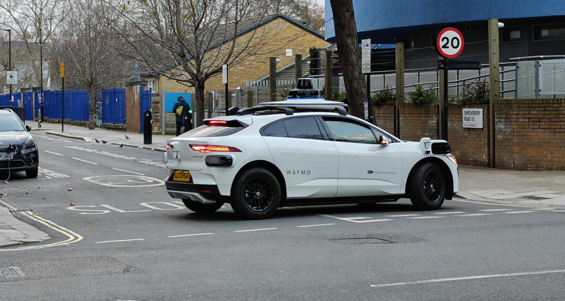 Waymo doing a U-turn in Notting Hill (OC)