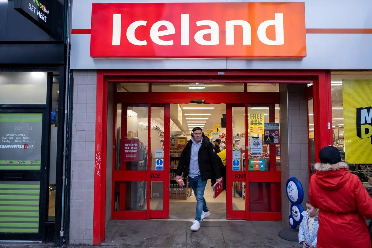 People walking out of Iceland store