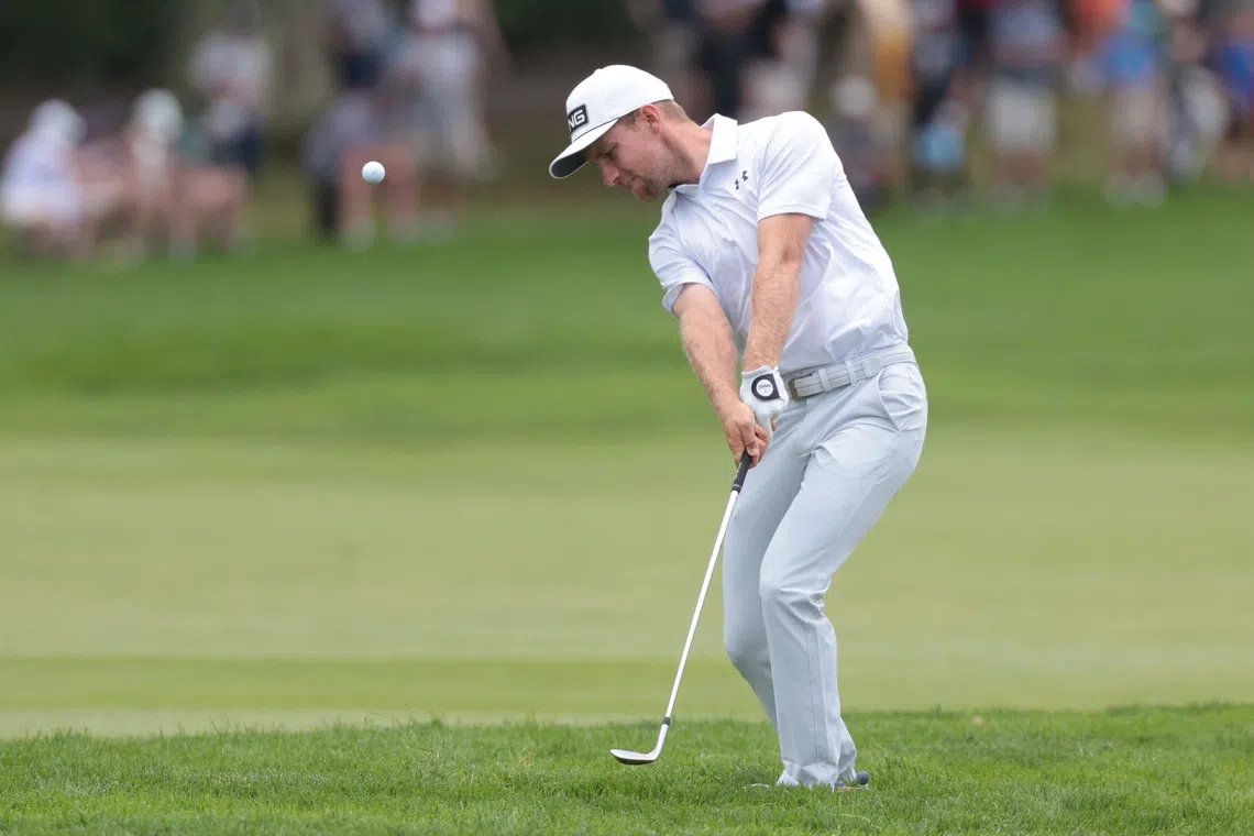 Jun 14, 2025; Oakmont, Pennsylvania, USA; Rasmus Neergaard-Petersen chips on the second green during the third round of the U.S. Open golf tournament. Mandatory Credit: Bill Streicher-Imagn Images