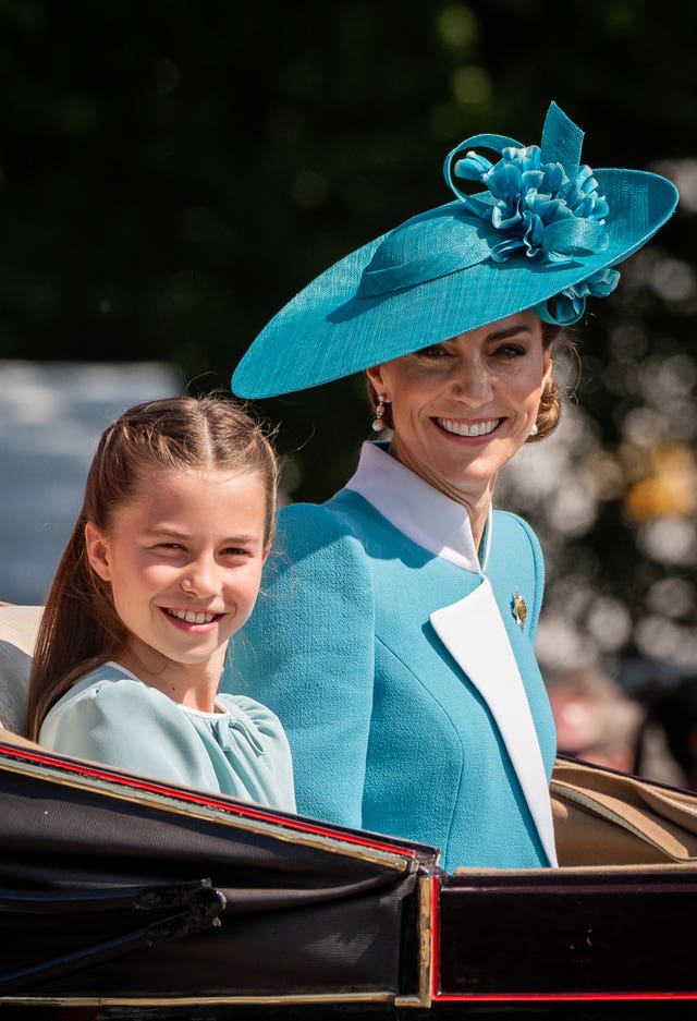 Kate and Charlotte in a carriage ahead of the Trooping the Colour ceremony