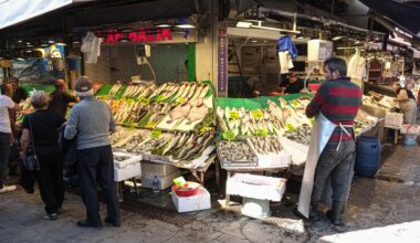 A worker at a seafood stall in an Istanbul farmers market