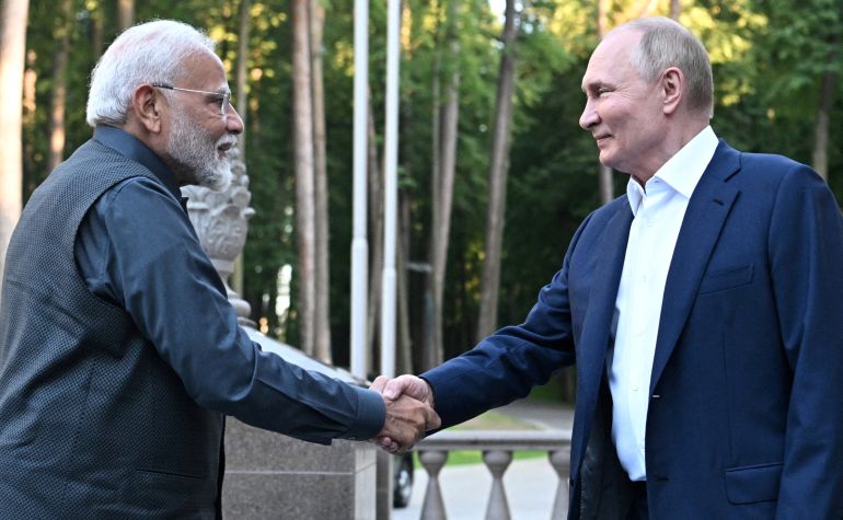 Russia's President Vladimir Putin shakes hands with India's Prime Minister Narendra Modi during their meeting at the Novo-Ogaryovo state residence near Moscow, Russia July 8, 2024.