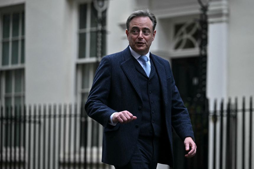 Belgium's Prime Minister Bart de Wever, seen here arriving for a meeting with the British prime minister on December 12, 2025, has repeatedly said the option of a reparations loan is risky.