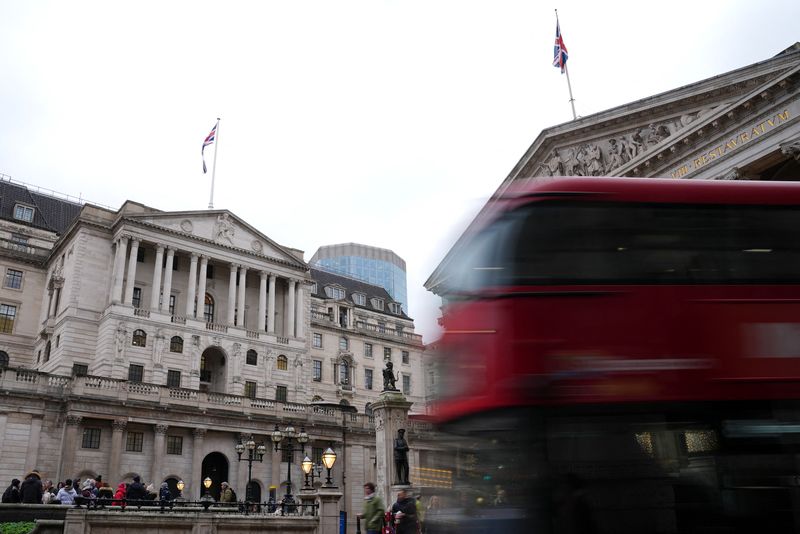 Bank of England cuts rates in tight vote, sterling rises | WTAQ News Talk | 97.5 FM · 1360 AM