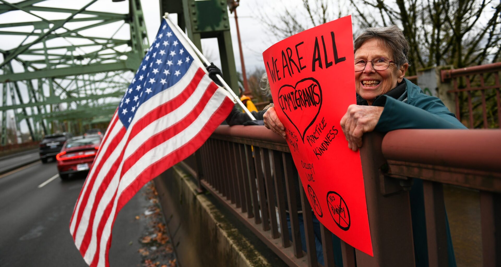 Despite rain, community members turn out to rally in support of immigrants