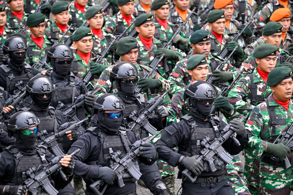 Army personnel march on Oct. 5, 2025, during an event marking the 80th anniversary of the Indonesian Military (TNI) in Banda Aceh, Aceh.