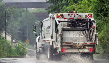 A truck for Noble Environmental, the parent company of Westmoreland Sanitary Landfill in Belle Vernon, Pa., drives down a road on a rainy day. Credit: Scott Goldsmith/Inside Climate News