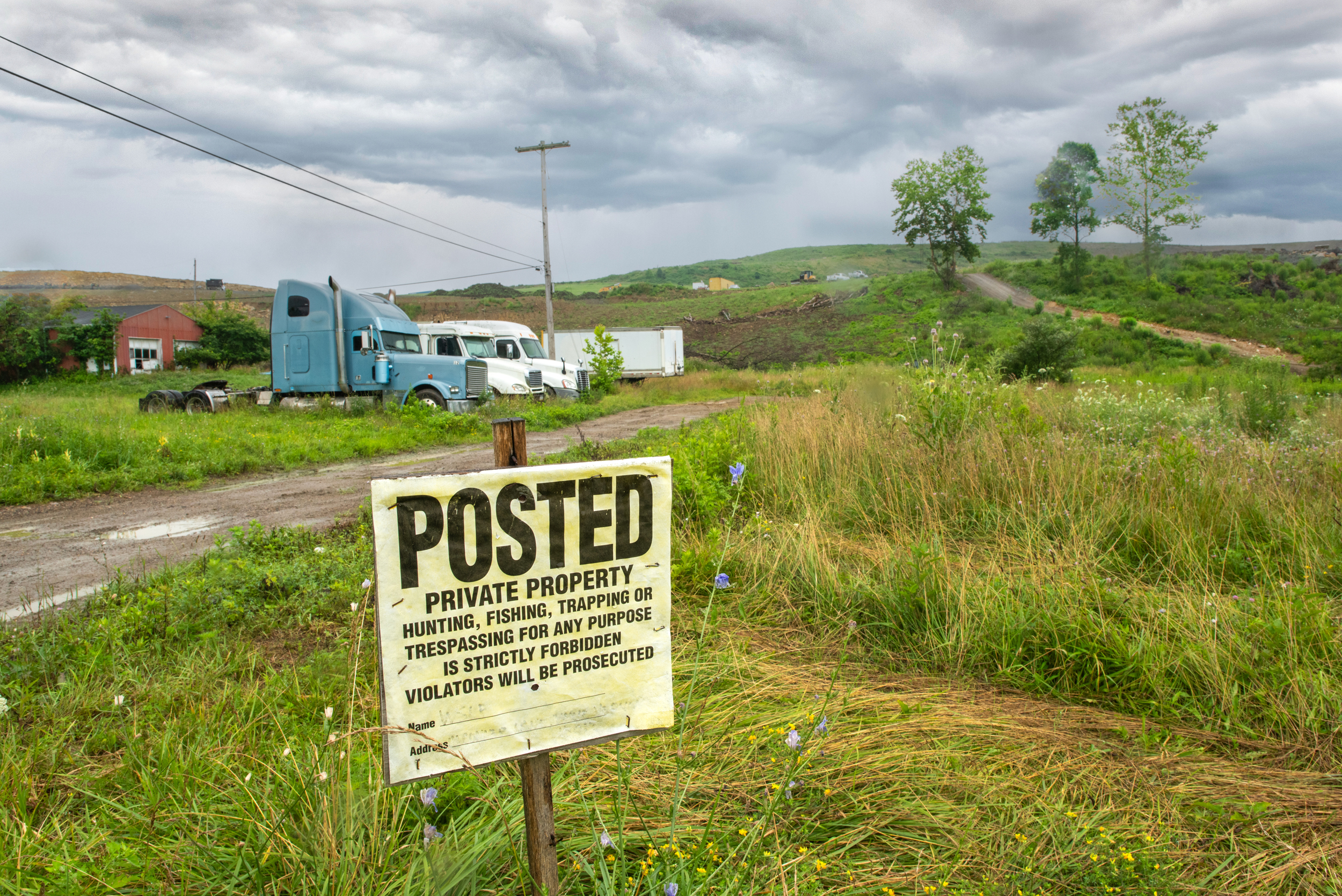 A private property sign posted at the edge of the Westmoreland Sanitary Landfill property in Belle Vernon, Pa. Credit: Scott Goldsmith/Inside Climate News