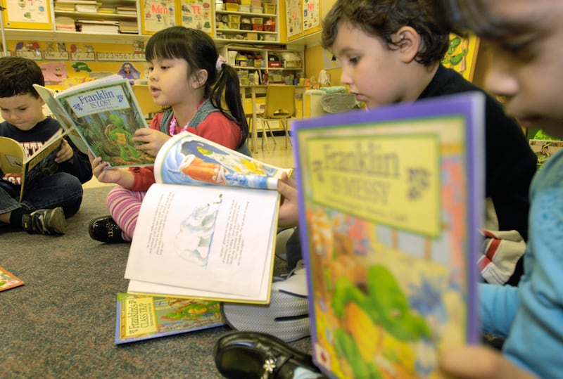Kids from Dolly Fox's kindergarten class read Franklin books. Each year Fox incorporates Franklin the Turtle into her kindergarten curriculum on Canadian authors.