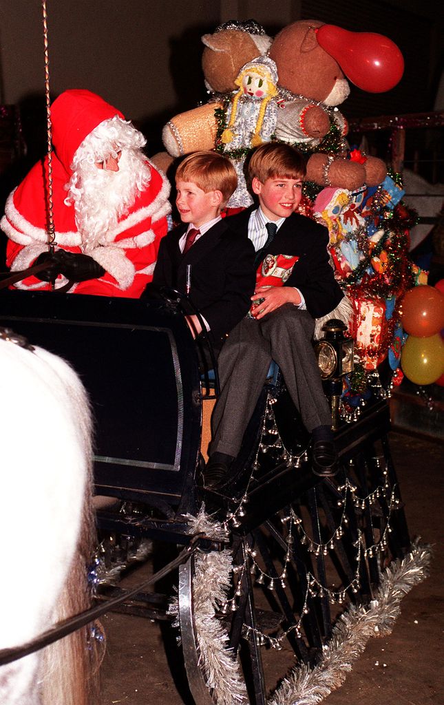 william and harry as kids on sleigh with santa