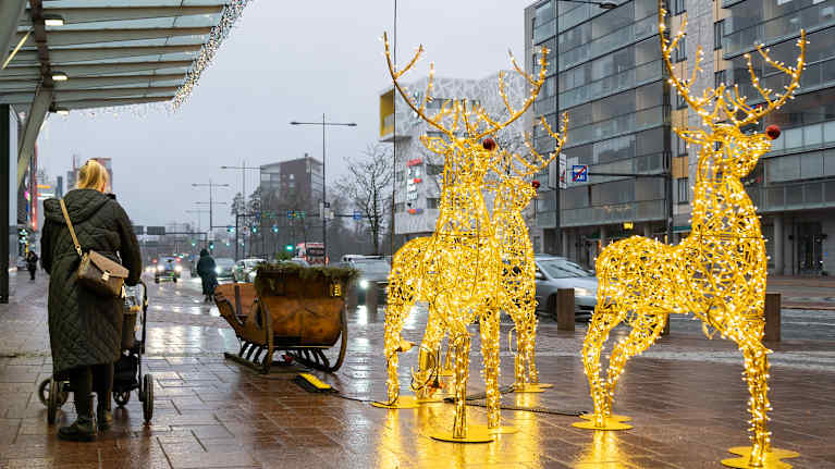 Photo shows two plastic reindeer outside Iso Omena shopping centre in Espoo.